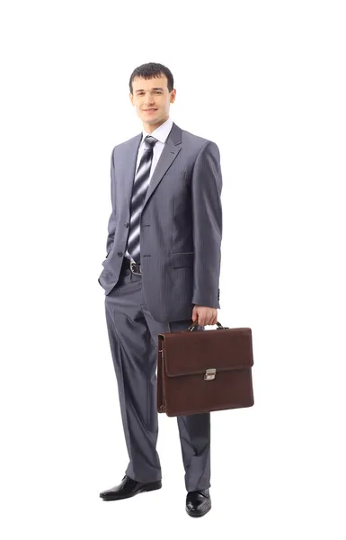 Volledige lengte van een vertrouwen zakenman met handen gevouwen geïsoleerd tegen — Stockfoto
