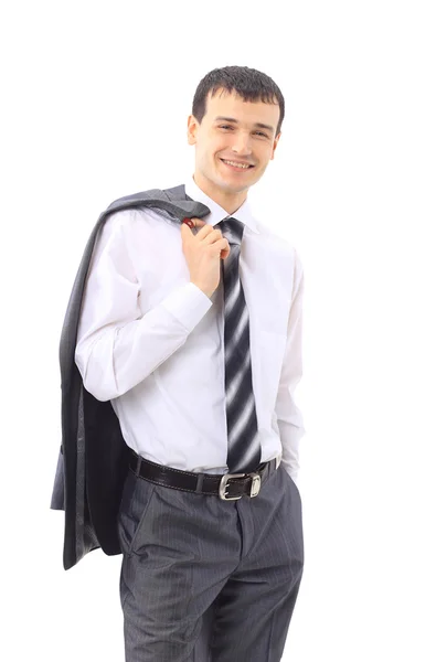 Šťastný mladý bussinessman s kabátem na rameni izolovaných na bílém pozadí — Stock fotografie