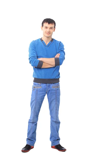 Полный портрет стильного молодого человека, стоящего с руками в карманах — стоковое фото