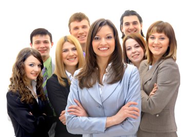 Happy young business woman standing in front of her team clipart