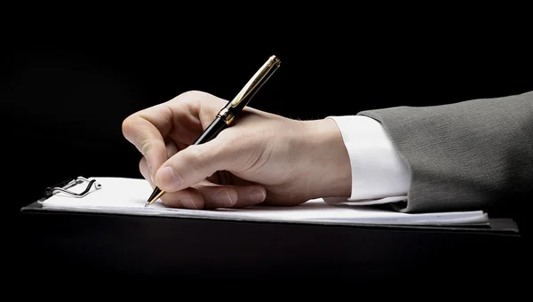 Businessman's hand with pen — Stock Photo, Image