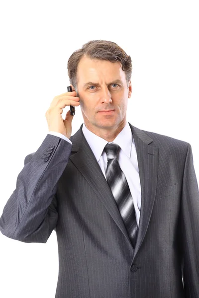 Очаровательный бизнесмен звонит изолированным на белом фоне — стоковое фото