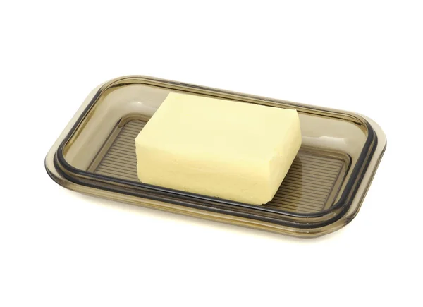 Boter op glas butterdish — Stockfoto