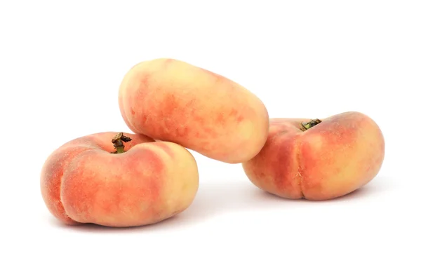 Плоский персики — стокове фото