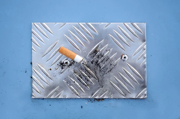 Cigarette End on Cigarette Stubbing Plate