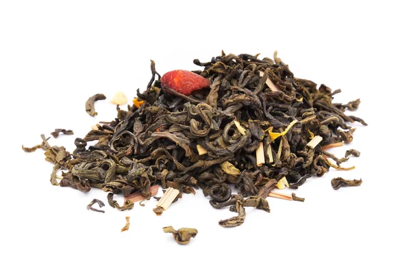 Losse groene thee met citrus-schillen en bloemblaadjes — Stockfoto
