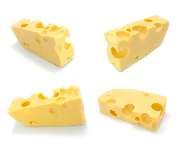 Ένα Σύνολο Από Τέσσερα Χοντρά Κομμάτια Του Ελβετικό Τυρί Απομονωθεί — Φωτογραφία Αρχείου