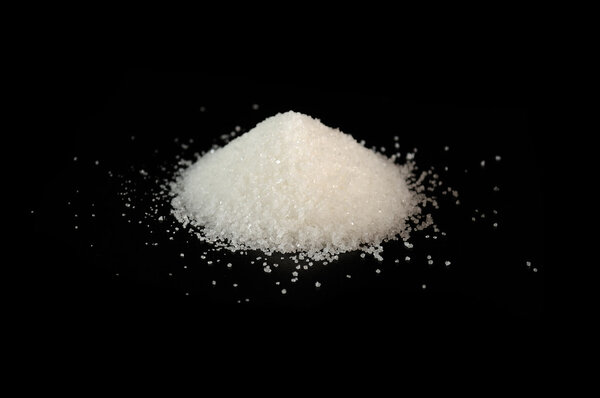 Pile of Sugar on Black Background
