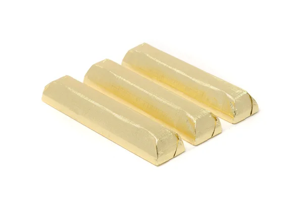 Chocolate embrulhado em folha dourada — Fotografia de Stock