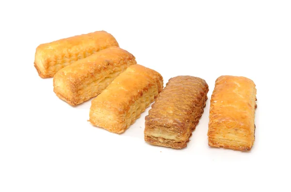 Flockige Kekse isoliert auf weißem Hintergrund — Stockfoto