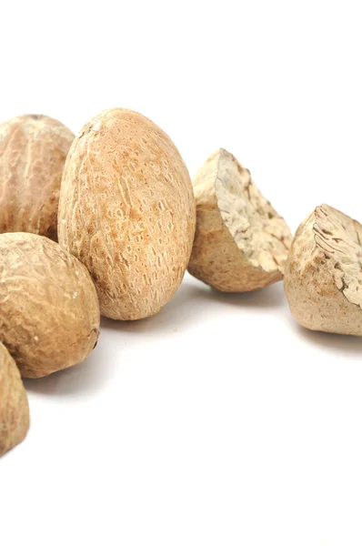 Nutmegs on White Background — Stock Photo, Image