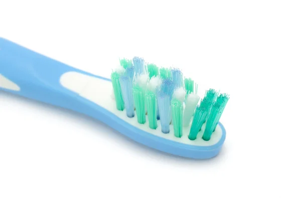 Elektrische tandenborstel op witte achtergrond — Stockfoto