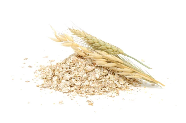 Pšenice, oves a žito vločky s ušima — Stock fotografie