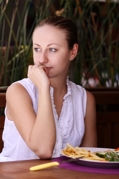 Happy woman in the resort cafe — Stock Photo, Image