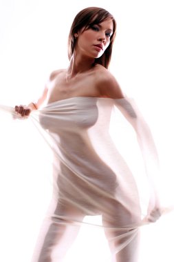 Nude of girl silhouetted behind sheer cloth clipart