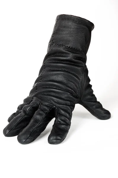 Een hand in een handschoen — Stockfoto