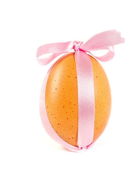 Easter egg, decorated a pink ribbon — Stock Photo, Image