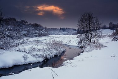 Winter landscape at sunset clipart