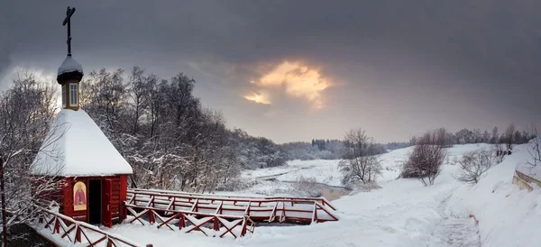 Winter landscape with sacred source — Stock Photo, Image