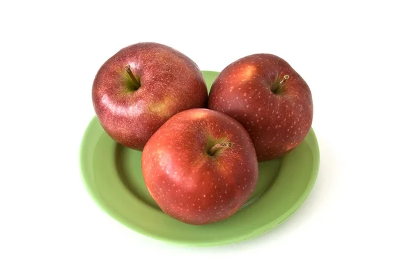 Jabłka na talerzu — Zdjęcie stockowe