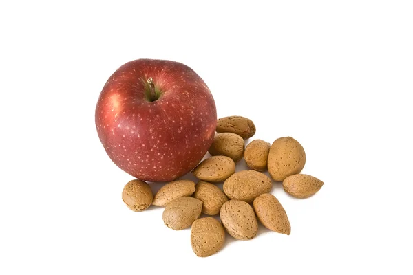 Яблоко с орехами — стоковое фото
