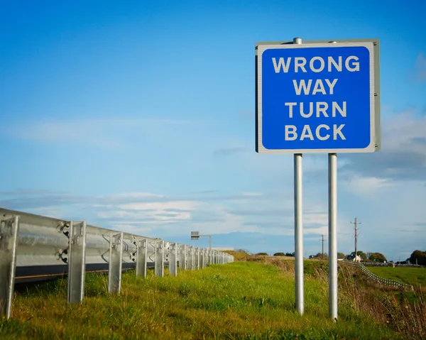 Road Sign Wrong Way Blue Sky Clouds — Stock Photo, Image