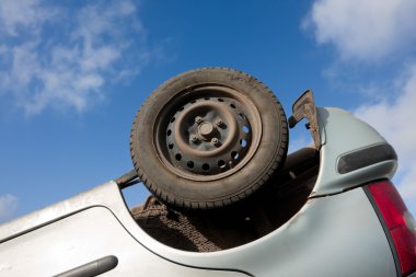Car turned upside-down, detail clipart