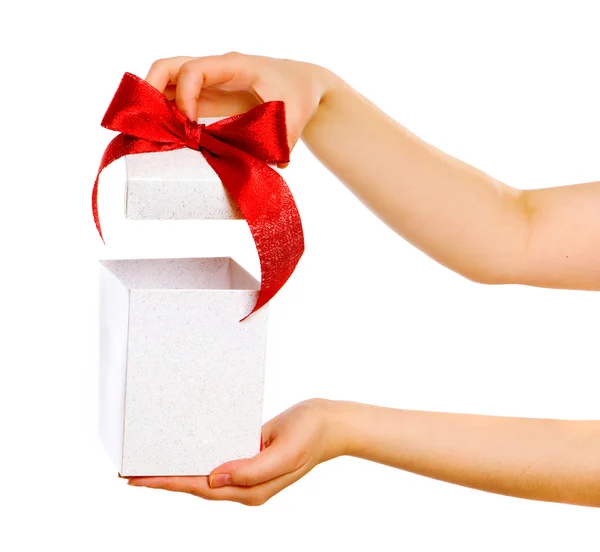 Red gift with hands — Stock Photo, Image