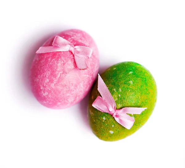 Αυγό Ροζ Και Πράσινο Αυγό Στο Ροζ Κλωστοϋφαντουργίας Φόντο — Φωτογραφία Αρχείου