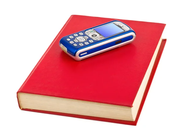 Telefon komórkowy na książki — Zdjęcie stockowe