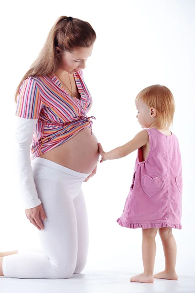 Pregnant Mother Her Small Daughter Studio Shot — Stock Photo, Image
