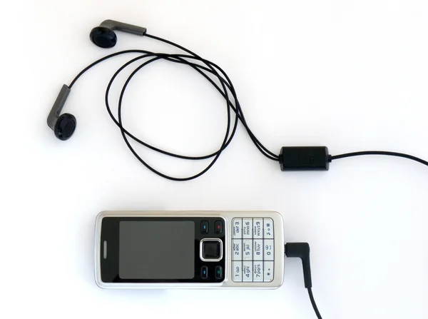 Telefone celular e minitypeface — Fotografia de Stock