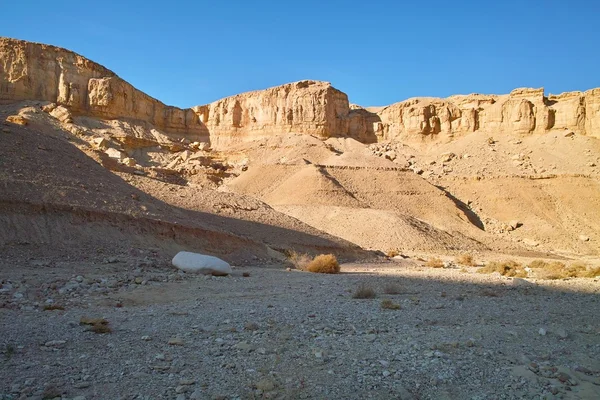 Sandstone rocks in the desert at sunset — Stock Photo, Image