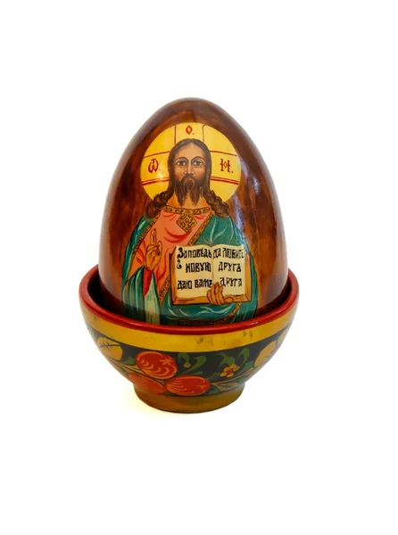 Russian easter egg with Jesus Christ in wooden cup — Stock Photo, Image