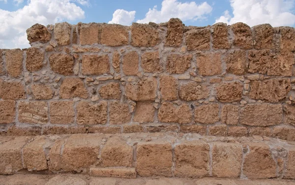 Textura antigua pared de piedra amarilla — Foto de Stock
