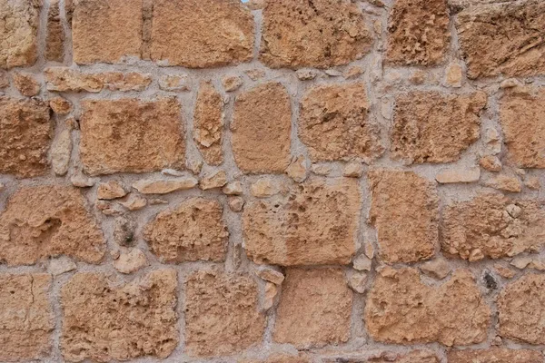 Antica struttura della parete di pietra gialla — Foto Stock