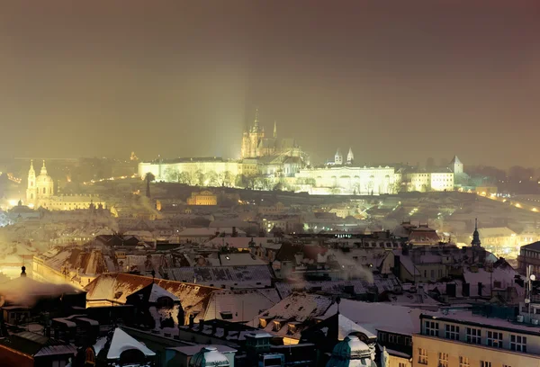 Prague Castle at twilight in haze — Stock Photo, Image
