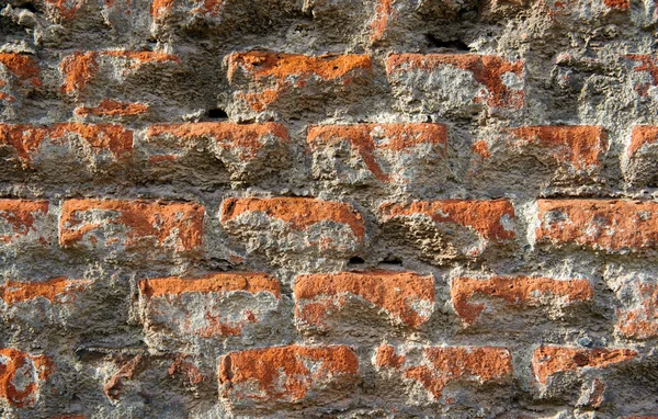 Velha parede de tijolo destruído — Fotografia de Stock