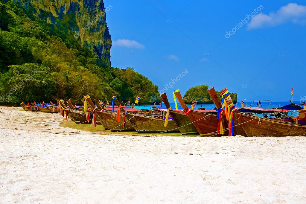 Longtailboats tied up at a beach in Krabi