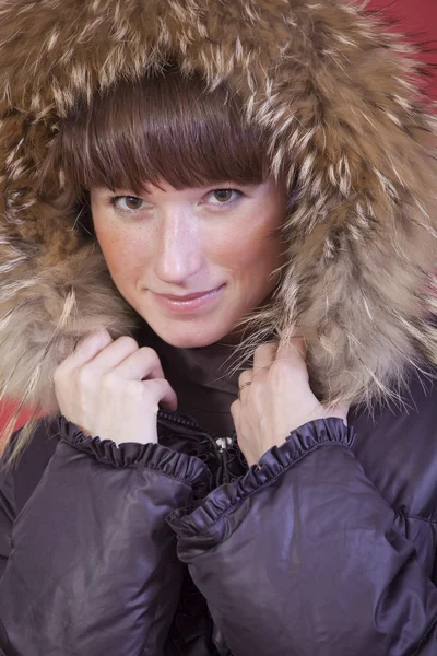 Woman in fur hood — Stock Photo, Image