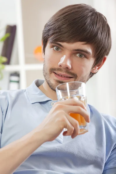 Man with glass juice — Stock Photo, Image