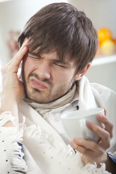 Sick man with headache — Stock Photo, Image