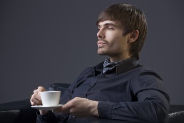 Proud man with cup coffee clipart