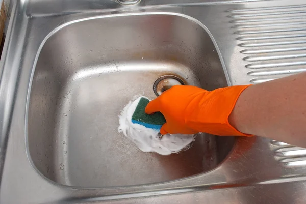 Person cleaning the kitchen sink with a glove — Stock Photo © Alexan66 ...