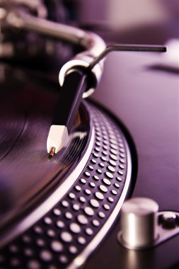 Vinyl record player spinning the disc clipart
