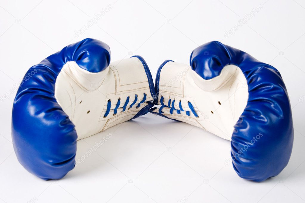 Pair of boxing gloves on white