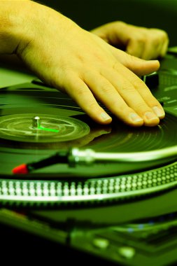 Hip-hop DJ scratching the record clipart