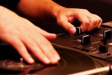 Hip-hop DJ scratching the vinyl clipart