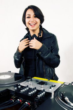 Female DJ at the turntables clipart
