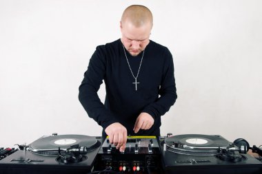 Bold hip-hop DJ mixing vinyl clipart